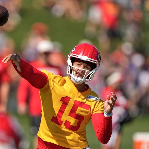 Kansas City Chiefs quarterback Patrick Mahomes throws during NFL football training camp Saturday, Aug. 1, 2026, in St. Joseph, Mo. (AP Photo/Charlie Riedel)