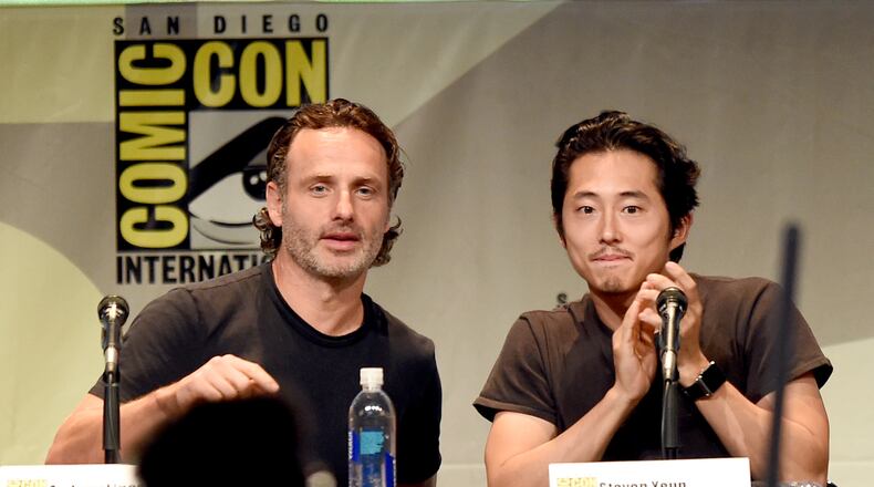 SAN DIEGO, CA - JULY 10: Actors Andrew Lincoln (L) and Steven Yeun speak onstage at AMC's "The Walking Dead" panel during Comic-Con International 2015 at the San Diego Convention Center on July 10, 2015 in San Diego, California. (Photo by Kevin Winter/Getty Images)