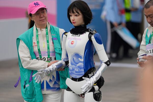 A robot attends the Humanoid Robot Half-Marathon held in Beijing on Saturday, April 19, 2025. (AP Photo/Ng Han Guan)
