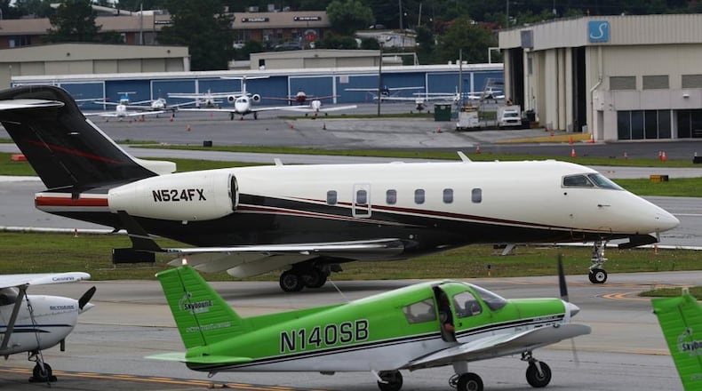 The airport houses a number of corporate jets. AJC file photo