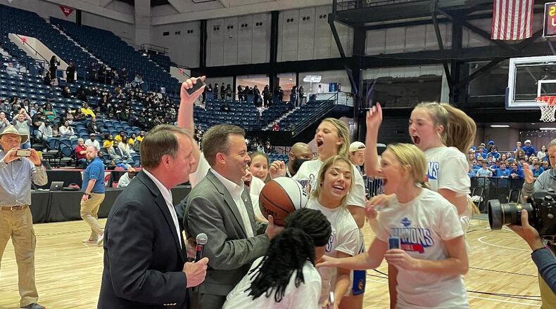 Coach Ed Wilson and the Lake Oconee Academy players celebrate their 45-29 victory over Hancock Central in the Class A Public championship game on Wednesday, March 9, 2022, at the Macon Coliseum.