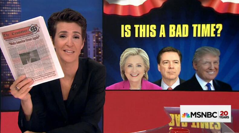 During a segment on her show, MSNBC’s Rachel Maddow focused in particular on a copy of the KKK newspaper, called the Crusader, that was deposited on a front lawn in Cartersville. Credit: MSNBC via video screengrab