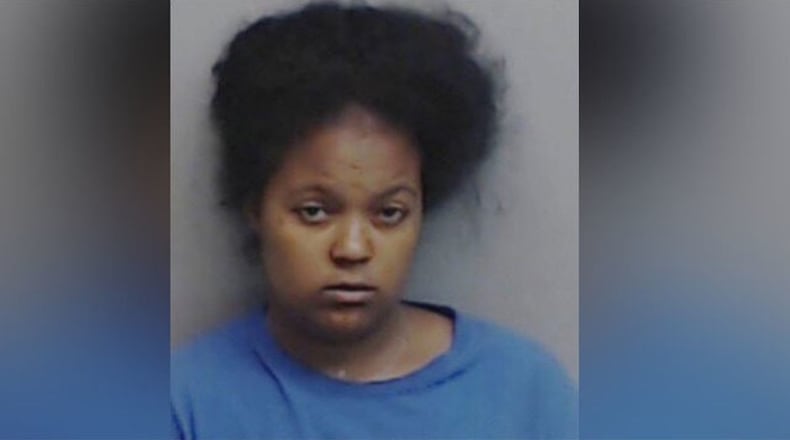Lamora Williams, 24, is accused of placing two of her children into an oven and turning it on.