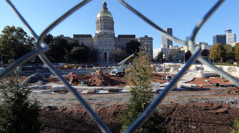 Liberty Plaza, the new park and protest area across from the State Capitol, still has a ways to go as construction workers race to finish before the the Legislative session kicks off at the beginning of 2015. BEN GRAY / BGRAY@AJC.COM