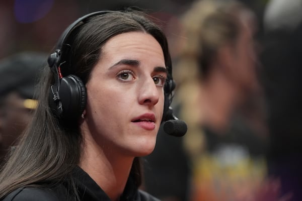 Indiana Fever's Caitlin Clark is interviewed during the second half of a WNBA All-Star basketball game Team Collier, Saturday, July 19, 2025, in Indianapolis. (AP Photo/Michael Conroy)