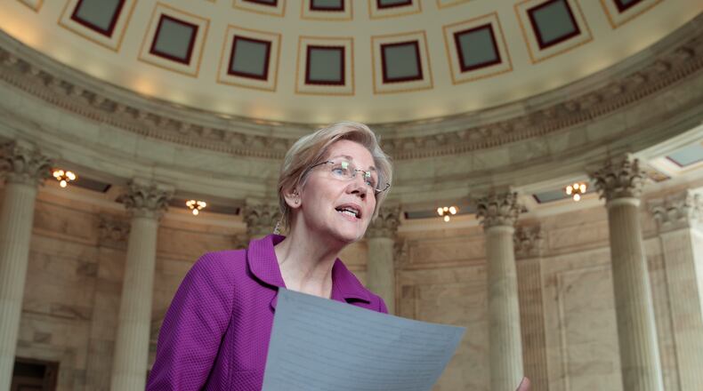 Sen. Elizabeth Warren, D-Mass. reacts to being rebuked by the Senate leadership and accused of impugning a fellow senator, Attorney General-designate, Sen. Jeff Sessions, R-Ala., Wednesday, Feb. 8, 2017, on Capitol Hill in Washington Warren was barred from saying anything more on the Senate floor about Sessions after she quoted from an old letter from Martin Luther King Jr.'s widow about Sessions. (AP Photo/J. Scott Applewhite)