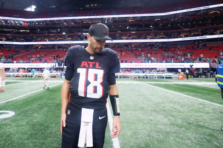 Atlanta Falcons quarterback Kirk Cousins (18) looks down after the game at Mercedes-Benz Stadium in Atlanta on Sunday, October 26, 2025. The Miami Dolphins beat the Atlanta Falcons 34-10. (Miguel Martinez/ AJC)