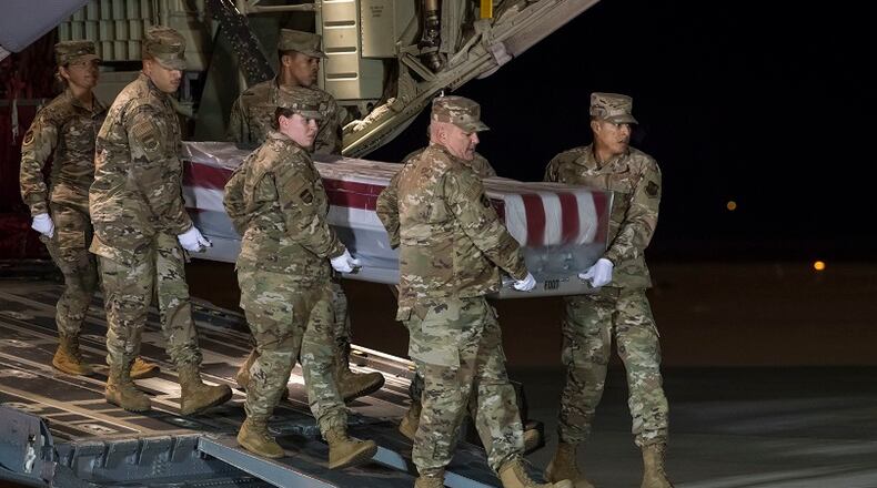 U.S. Air Force officials transfer the body of Airman Apprentice Cameron Walters, 21, of Richmond Hill, at Dover Air Force Base, Del., Dec. 8, 2019. U.S. Air Force Photo by Senior Airman Christopher Quail.