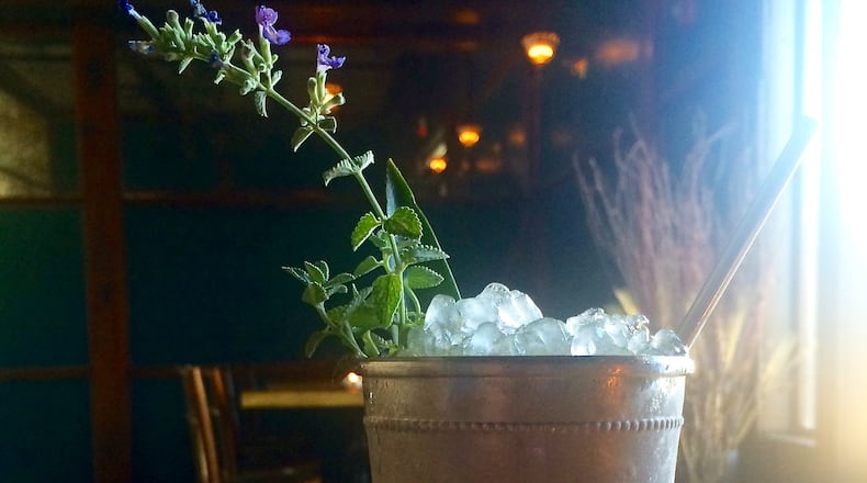 While we love whiskey and the traditional julep, we suggest sipping on the cognac-based Bastille at Kimball House’s new weekend cocktail joint Bonanza.