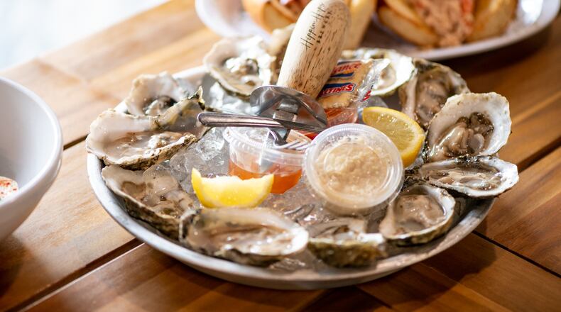Oysters are king at Hippin Hops Brewery. These are freshly shucked oysters on a half-shell served with lemon, cocktail sauce, horseradish, and Hippin Hops' Mignonette Sauce. (Mia Yakel for The Atlanta Journal-Constitution)