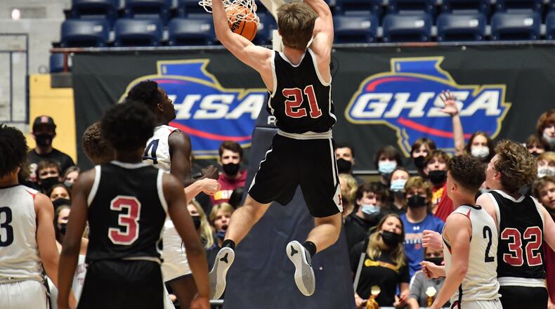 March 10, 2021 Macon - Holy Innocents' Landon Kardian (21) dunks the ball during the 2021 GHSA State Basketball Class A Private Championship game at the Macon Centreplex in Macon on Wednesday, March 10, 2021. Mt. Pisgah won 43-41 over Holy Innocents. (Hyosub Shin / Hyosub.Shin@ajc.com)