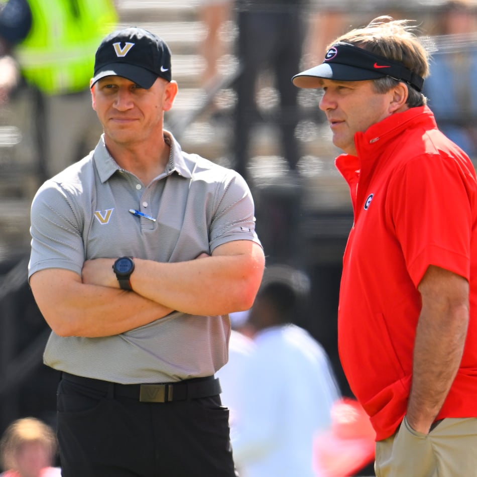 Vanderbilt head coach Clark Lea (left) and Georgia head coach Kirby Smart speak before their game on Saturday, Oct. 14, 2023, in Nashville, Tenn. Vanderbilt does not have the same opportunity that Georgia does this weekend. (John Amis for the AJC 2023)