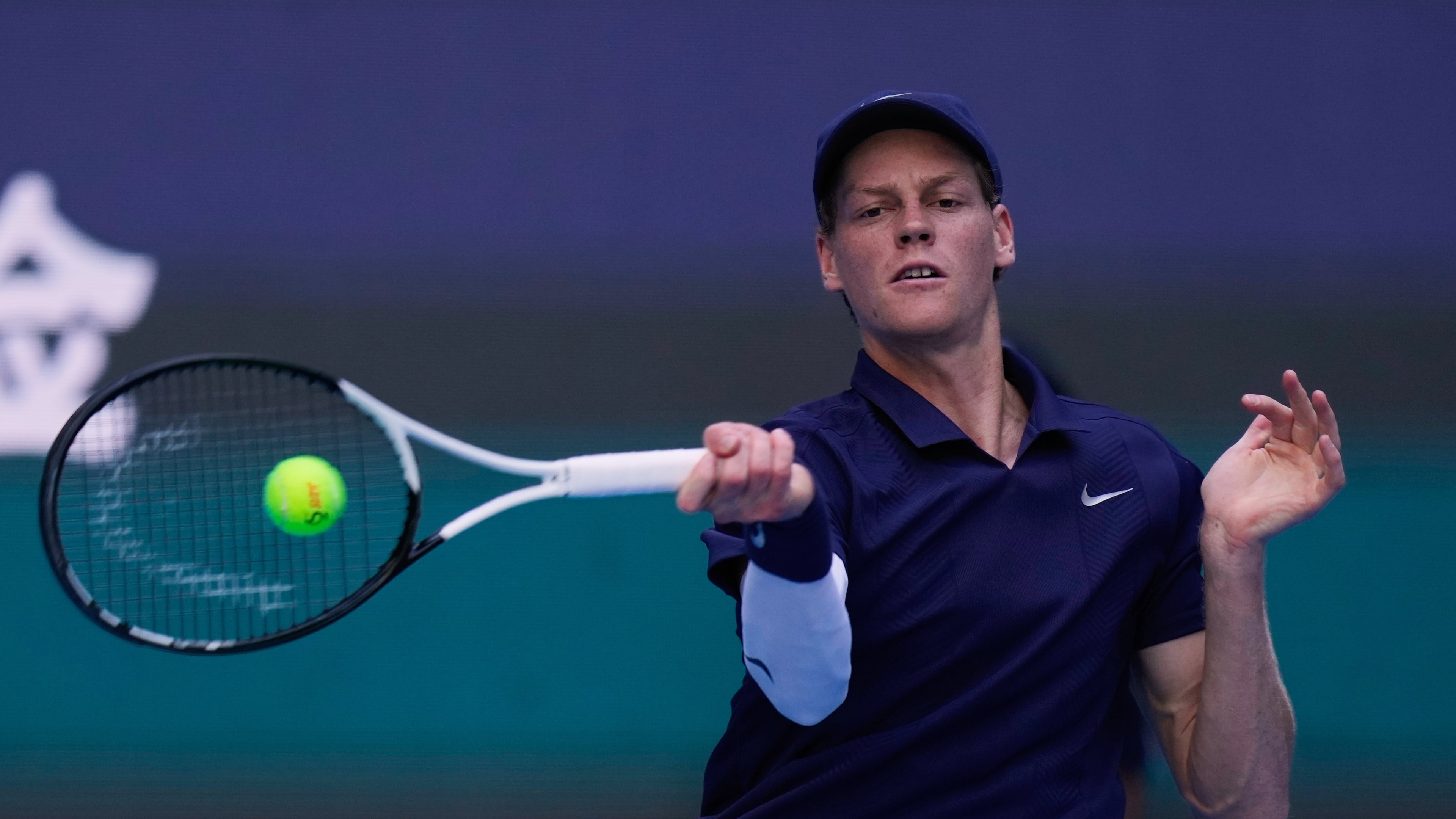 Jannik Sinner of Italy returns a forehand shot to Fabian Marozsan, of Hungary during a men's singles match of the China Open tennis tournament, at the National Tennis Center, in Beijing, China, Monday, Sept. 29, 2025. (AP Photo/Mahesh Kumar A.)