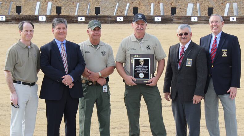 From left, Chuck Rann, Commission Chairman David Austin, Colonel From left, Jim Walker, Sheriff Gary Gulledge, Chaplain Joey Meeks, Chaplain Dennis Nunn
