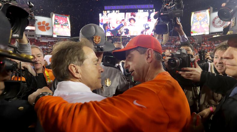 Alabama coach Nick Saban congratulates Clemson coach Dabo Swinney after the Tigers beat the Crimson Tide 35-31 in the College Football Playoff championship game at Raymond James Stadium on Jan. 9, 2017 in Tampa, Fla. (Photo by Streeter Lecka/Getty Images)