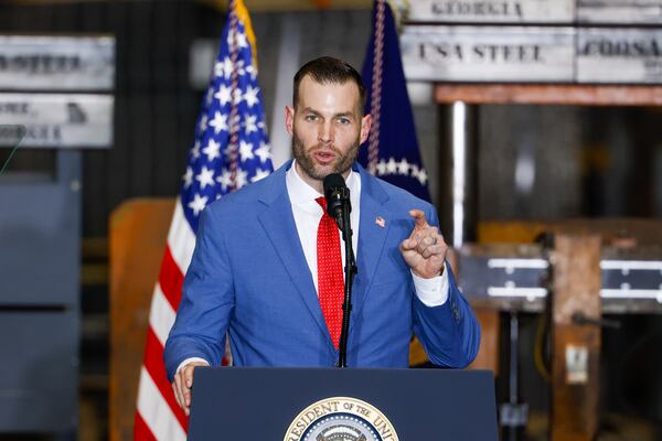 Clay Fuller, who is running for Marjorie Taylor Greene's former congressional seat, spoke during President Donald Trump's February rally at the Coosa Steel service center in Rome. (Arvin Temkar/AJC)