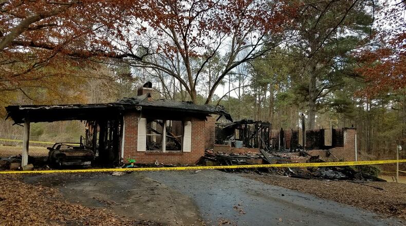 A woman’s body was found after a house fire in Haralson County.