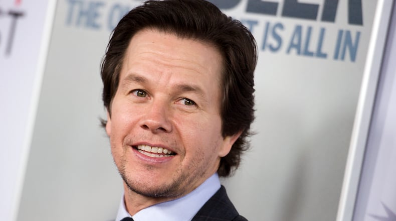 Mark Wahlberg and his brothers are planning to open Wahlburgers locations in Georgia. (Photo by Richard Shotwell/Invision/AP, File)