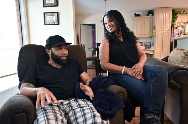  COVID-19 survivor David Simpson with his wife Veronica at their home in West Point. “I was so scared that he was going to die,” said Veronica Simpson, who had just celebrated their 25th wedding anniversary with him before he became ill. “I was praying and asking God to keep him here.”