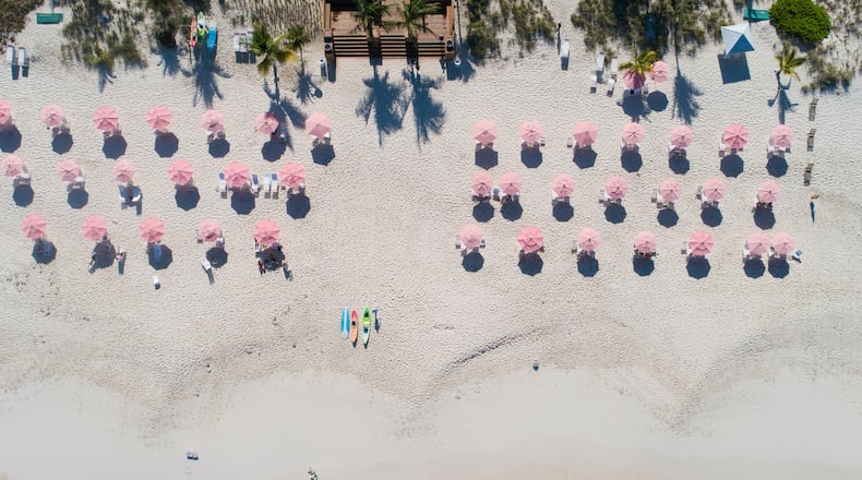 The Ocean Club Resorts' signature pink umbrellas shade one of the world's top beach destinations in Turks & Caicos.
Courtesy of Ocean Club Resorts