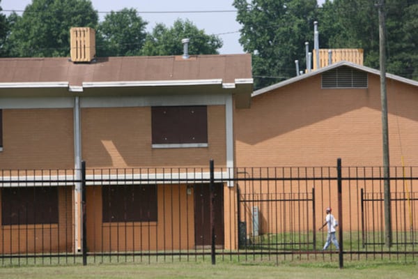 Bowen Homes was a sprawling complex of two-story, orange-colored duplexes, with an elementary school and a library. It was demolished shortly after this photograph was taken in June 2009. (AJC file photo)