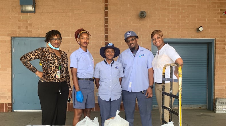 In May, a group of Brookhaven residents purchased 100 meals and donated them to U.S. Postal Service workers in Brookhaven. Courtesy of Matt Gunter