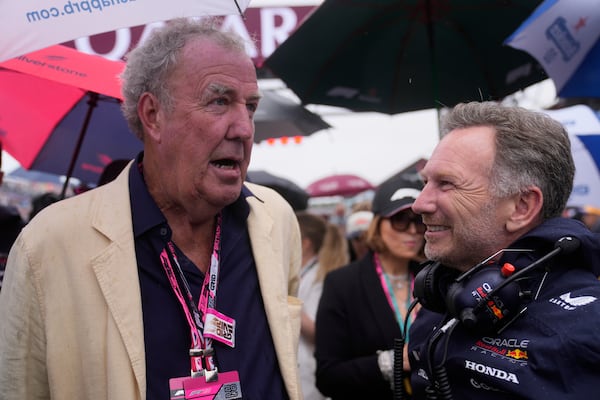 Red Bull team principal Christian Horner, right, speaks TV presenter Jeremy Clarkson before the British Formula One Grand Prix race at the Silverstone racetrack in Silverstone, England, Sunday, July 6, 2025. (AP Photo/Darko Bandic)