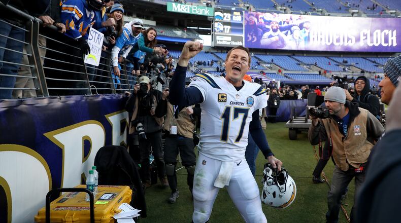 Philip Rivers of the Los Angeles Chargers celebrates after defeating the Baltimore Ravens after the AFC Wild Card Playoff game at M&T Bank Stadium on January 06, 2019 in Baltimore, Maryland. The Chargers defeated the Ravens with a score of 23 to 17. (Photo by Rob Carr/Getty Images)