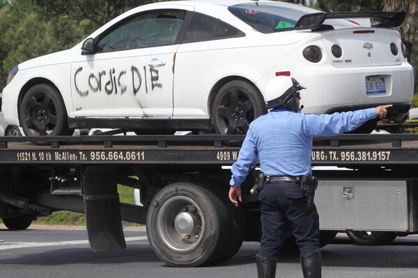 Vehicle belonging to suspect car is towed away from the scene at Rio Grande Valley Border Patrol Sector Annex, Monday, July 7, 2025, McAllen, Texas. (Delcia Lopez/The Monitor via AP)