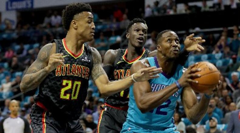The Hawks couldn't keep Dwight Howard away from the basket in the second half. (Photo by Streeter Lecka/Getty Images)