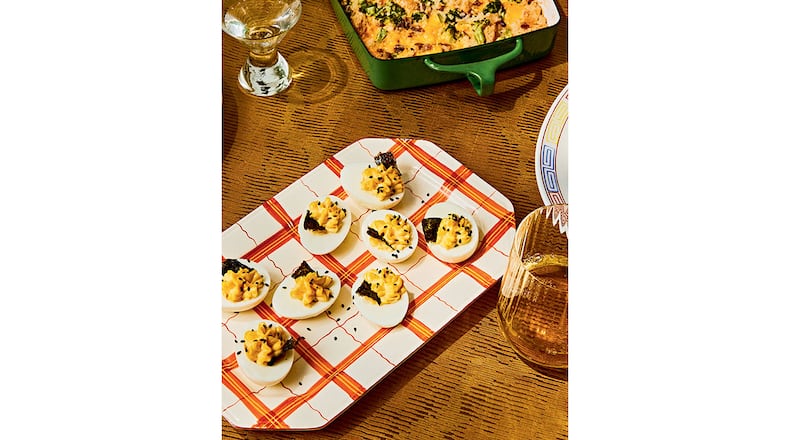 Sesame-Soy Deviled Eggs
“Reprinted from Korean American. Copyright © 2022 Eric Kim. Photographs copyright © 2022 Jenny Huang. Published by Clarkson Potter, an imprint of Random House.”