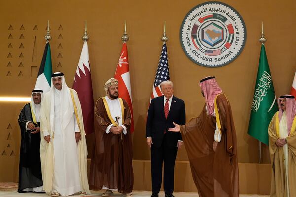 Saudi Crown Prince Mohammed bin Salman, right, welcomes President Donald Trump for the group photo with Gulf Cooperation Council leaders during the GCC Summit in Riyadh, Saudi Arabia, Wednesday, May 14, 2025. (AP Photo/Alex Brandon)