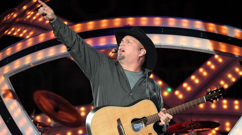 #3 of #27. PLEASE KEEP IN SEQUENTIAL ORDER FOR THE CONTINUITY OF THE GALLERY. -Garth Brooks sings "Man Against Machine." Legendary country singer-songwriter-guitarist Garth Brooks played the fist of seven sold out shows Friday evening at Philips Arena. Robb D. Cohen/RobbsPhotos.com Garth Brooks at Philips Arena Sept. 19. 2014. Photo: Robb Cohen/www.RobbsPhotos.com.