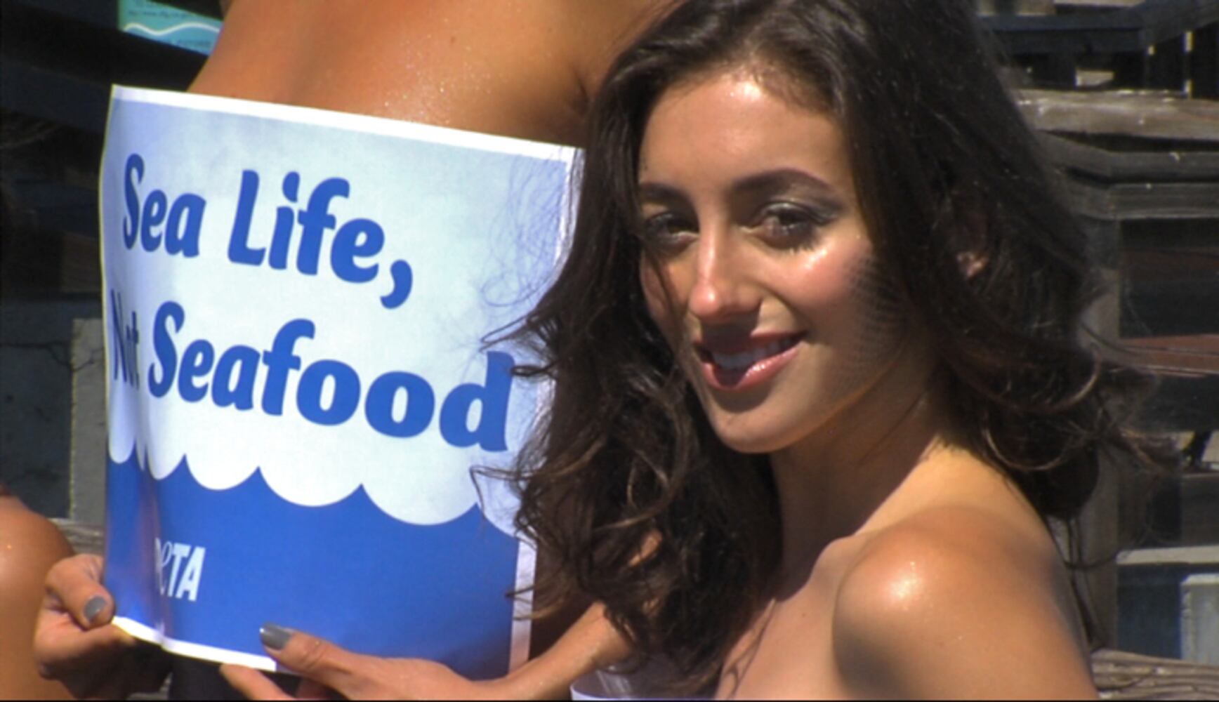 PETA and topless mermaids against seafood