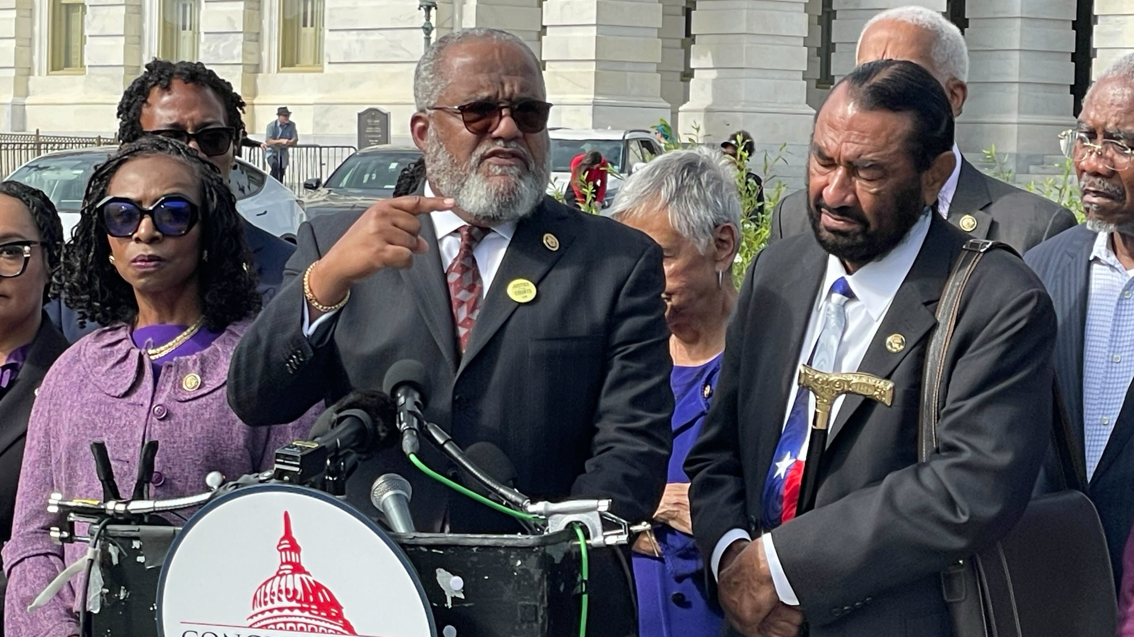 Rep. Troy Carter, D-La., and other members of the Congressional Black Caucus speak outside the U.S. Capitol after arguments were heard on the Voting Rights Act at the Supreme Court in Washington, Wednesday, Oct. 15, 2015. (AP Photo/Matt Brown)