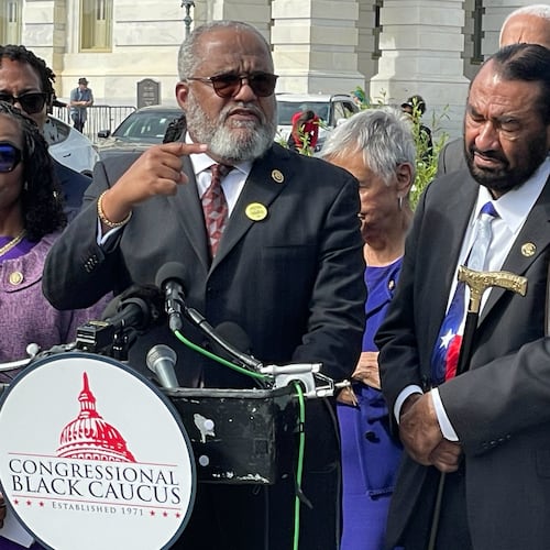 Rep. Troy Carter, D-La., and other members of the Congressional Black Caucus speak outside the U.S. Capitol after arguments were heard on the Voting Rights Act at the Supreme Court in Washington, Wednesday, Oct. 15, 2015. (AP Photo/Matt Brown)