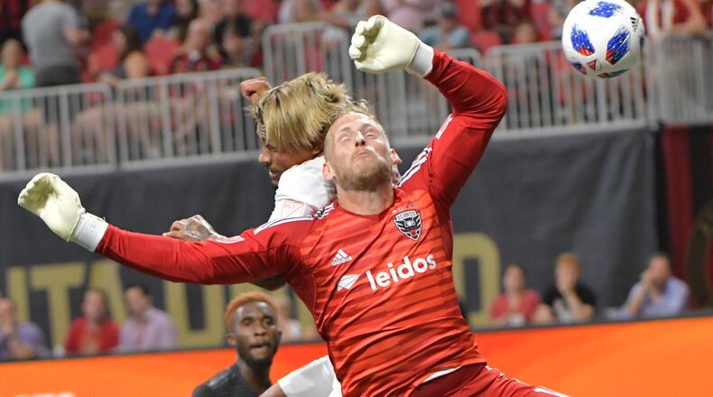 July 21, 2018  - Atlanta United forward Josef Martinez (7) makes a shot on goal past D.C. United goalkeeper David Ousted (1) during the first half in a MLS soccer game at Mercedes-Benz Stadium on Saturday, July 21, 2018. HYOSUB SHIN / HSHIN@AJC.COM