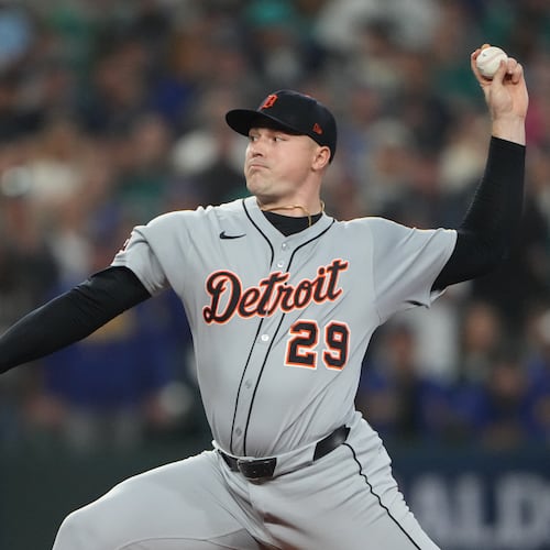 FILE - Detroit Tigers pitcher Tarik Skubal throws during the first inning in Game 5 of baseball's American League Division Series against the Seattle Mariners, Friday, Oct. 10, 2025, in Seattle. (AP Photo/Lindsey Wasson, File)