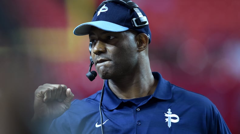 Pace Academy head coach Chris Slade reacts after his team sealed the win over Fitzgerald in the Class AA  state game Saturday, Dec. 12, 2015, at the Georgia Dome in Atlanta.