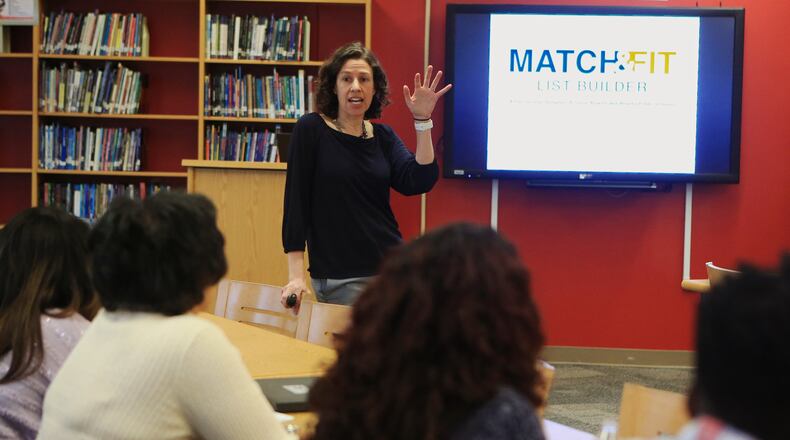 Korynn Schooley, vice president of college access at Achieve Atlanta, leads a training session for Atlanta Public Schools counselors on how to use a new computer-based college search tool on Monday, Jan. 27, 2020, at Maynard Jackson High School in Atlanta. (Christina Matacotta/crmatacotta@gmail.com)