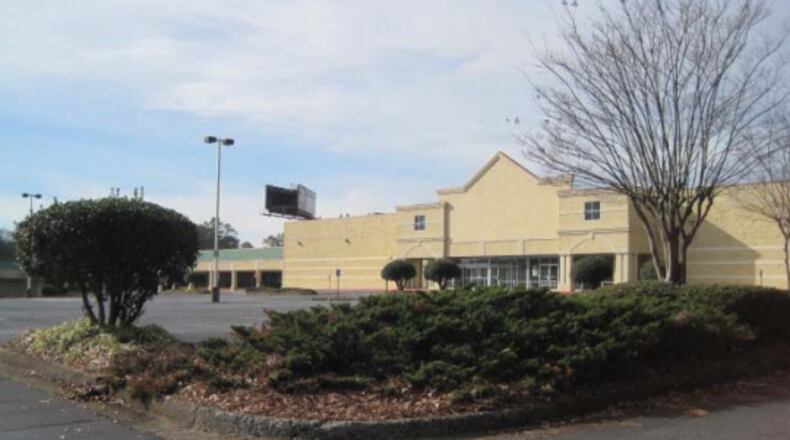 A look at the old Sport Authority in the Harry's Crossing Shopping Center from the Marietta application to rezone that property in order to build a Studio Movie Grill