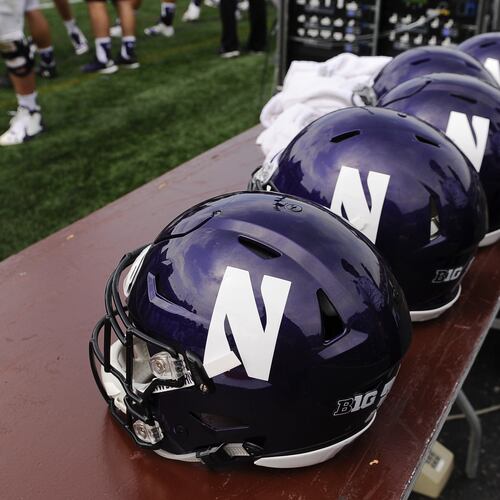 FILE - Northwestern football helmets at an NCAA college football against Stanford in Evanston, Ill, Sept. 5, 2015. (AP Photo/Matt Marton, File)