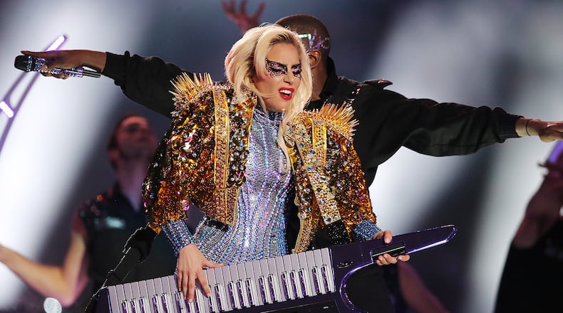 A week after throwing a glitter bomb on the Super Bowl, Lady Gaga will rock with Metallica on the Grammy Awards. Photo: Curtis Compton/AJC