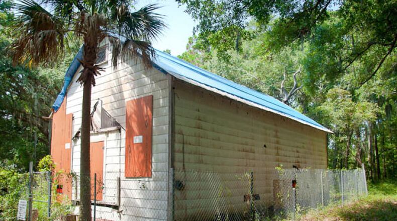 The Harrington School House, which was built in the 1920s and served as the main educational structure for three African-American communities on St. Simons Island, came close to being demolished, but it was saved. This photo was taken during the restoration process. CONTRIBUTED BY BENJAMIN GALLAND, H2O CREATIVE GROUP