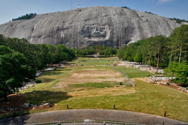 Atlanta resident Shannon Byrne recommends the six-mile Cherokee Trail around the base of Stone Mountain for an up-close experience with the trees, to counterbalance the more exposed walk-up trail. - Blake Guthrie, for the AJC