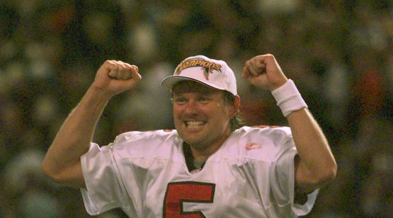Falcons' kicker Morten Andersen (5) yells for joy while holding clenched fists after his game-winning field goal beat the Minnesota Vikings in overtime of the NFC Championship game. (AJC Staff Photo/DAVID TULIS)