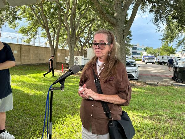 Christine Leinonen, whose son, Christopher "Drew" Leinonen was killed in the Pulse nightclub massacre in 2016, talks to reporters after walking through the venue as part of a group of survivors and family members of those killed, on Wednesday June 11, 2025 in Orlando, Florida. (AP Photo/Mike Schneider)