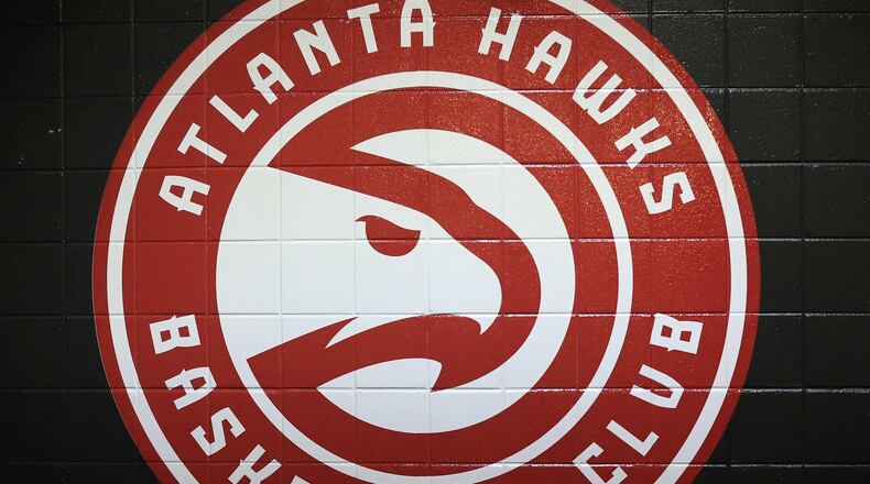 A new Hawks logo is painted on the tunnel wall leading out to the court for the first regular season basketball game on Tuesday, Oct. 27, 2015, in Atlanta. Curtis Compton / ccompton@ajc.com