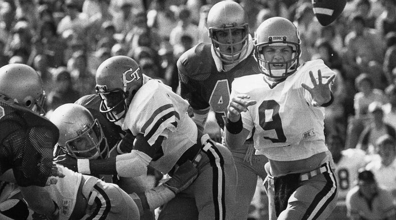 Georgia Tech freshman quarterback Ken Whisenhunt pitches to a trailing back against Notre Dame on Saturday, Nov. 8, 1980. (Bill Mahan/AJC file)