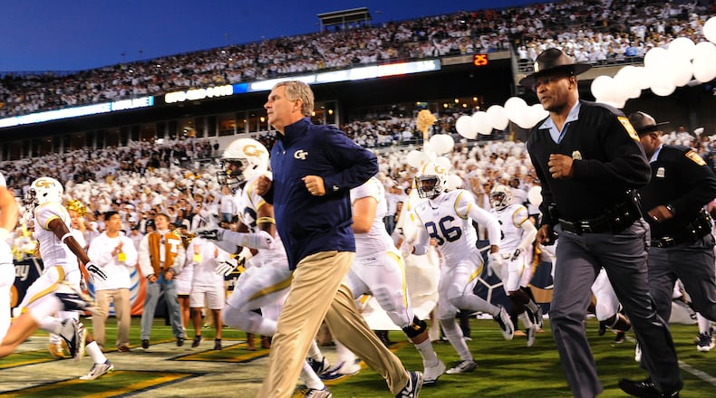 ATLANTA, GA - OCTOBER 4: Head Coach Paul Johnson of the Georgia Tech Yellow Jackets leads his team on to the field before the game against the Miami Hurricanes at Bobby Dodd Stadium on October 4, 2014 in Atlanta, Georgia. (Photo by Scott Cunningham/Getty Images)